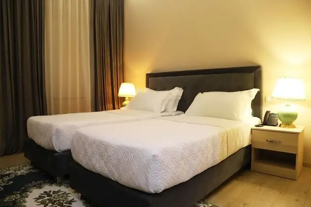 Deluxe Tek Büyük veya İki Ayrı Yataklı Oda