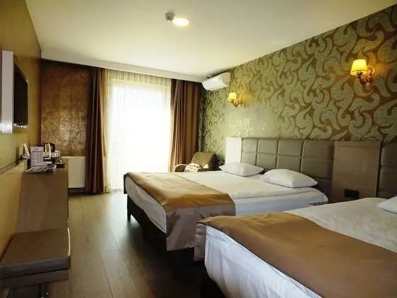 Deluxe Üç Kişilik Oda