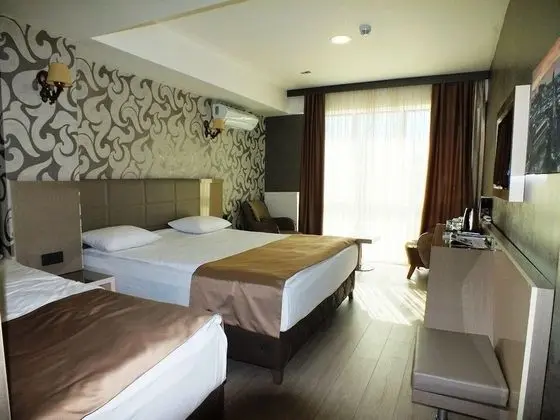 Deluxe Üç Kişilik Oda