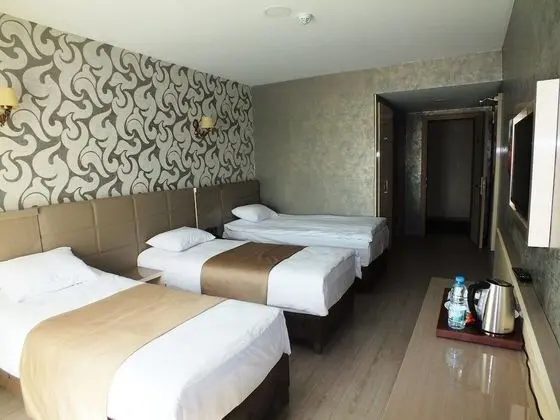 Deluxe Üç Kişilik Oda