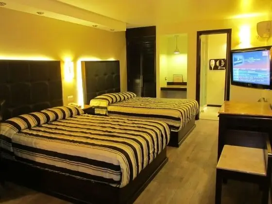 Room 2 Camas Matrimoniales