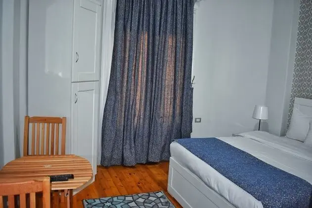 City Tek Büyük Yataklı Oda