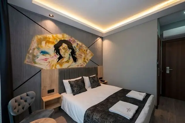 Deluxe Tek Büyük Yataklı Oda