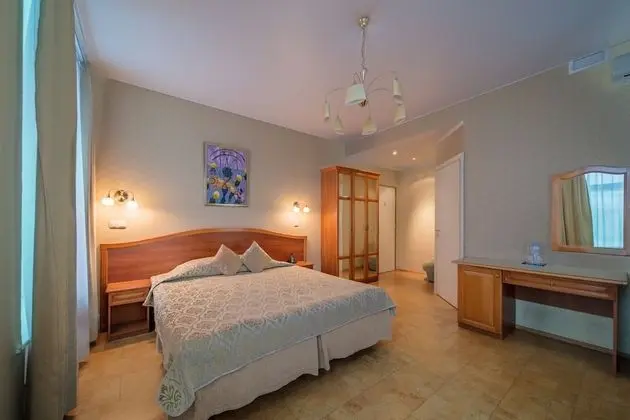 Deluxe Tek Büyük veya İki Ayrı Yataklı Oda
