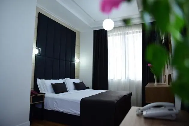 Deluxe Tek Büyük veya İki Ayrı Yataklı Oda