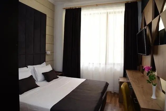 Deluxe Tek Büyük veya İki Ayrı Yataklı Oda