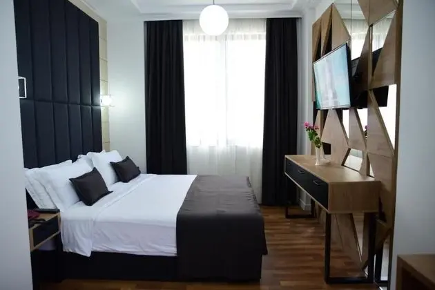 Deluxe Tek Büyük veya İki Ayrı Yataklı Oda