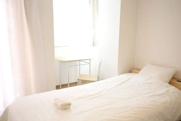 İki Ayrı Yataklı Oda, Ortak Banyo