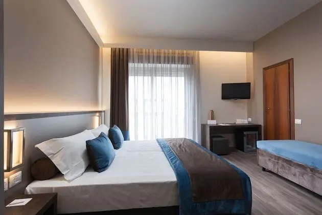 Deluxe Üç Kişilik Oda