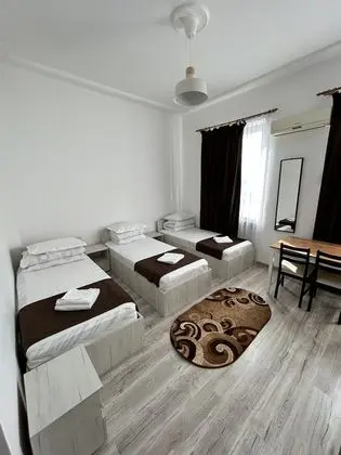 Üç Kişilik Oda