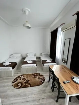 Üç Kişilik Oda