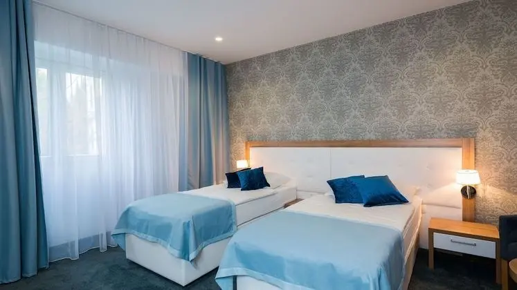 Comfort Tek Büyük veya İki Ayrı Yataklı Oda