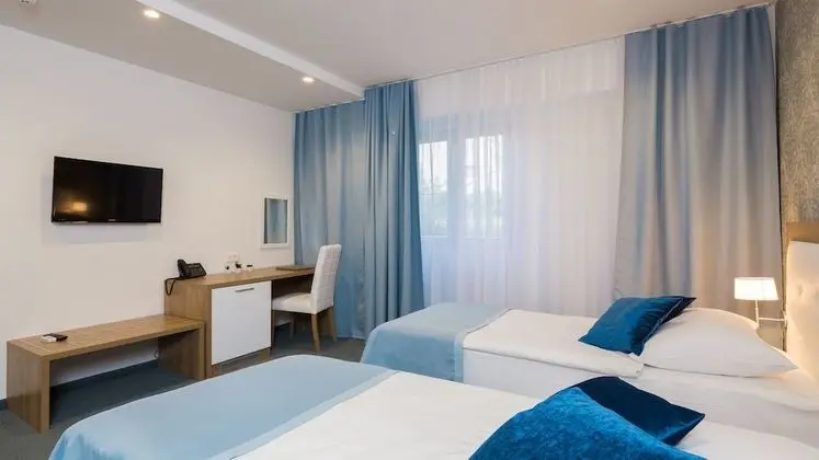 Comfort Tek Büyük veya İki Ayrı Yataklı Oda