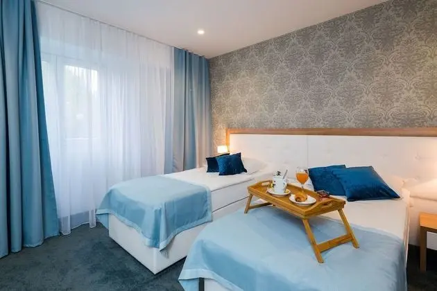 Comfort Tek Büyük veya İki Ayrı Yataklı Oda