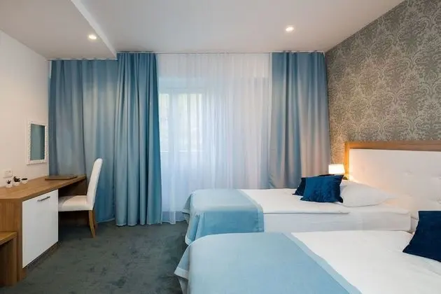 Comfort Tek Büyük veya İki Ayrı Yataklı Oda