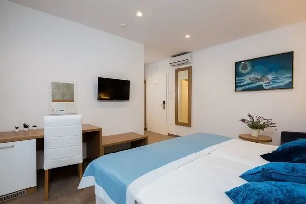 Comfort Tek Büyük veya İki Ayrı Yataklı Oda