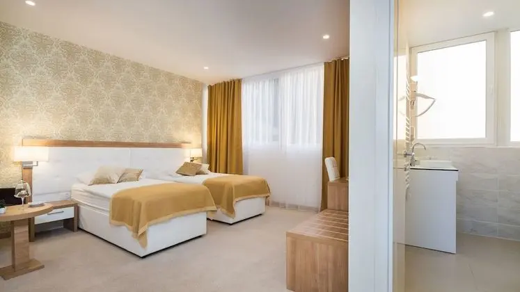 Comfort Tek Büyük veya İki Ayrı Yataklı Oda