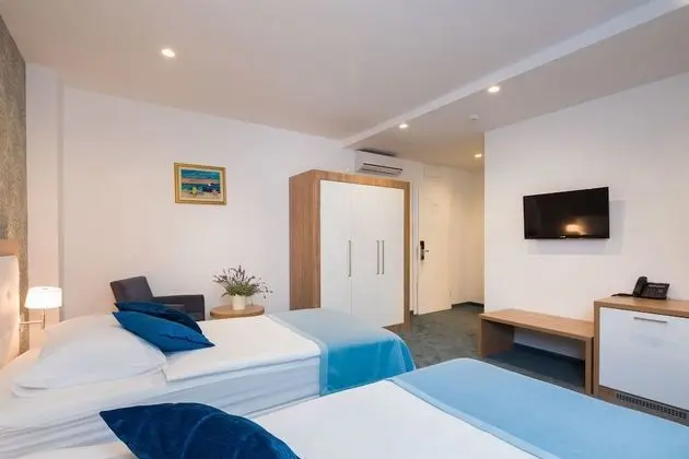 Comfort Tek Büyük veya İki Ayrı Yataklı Oda