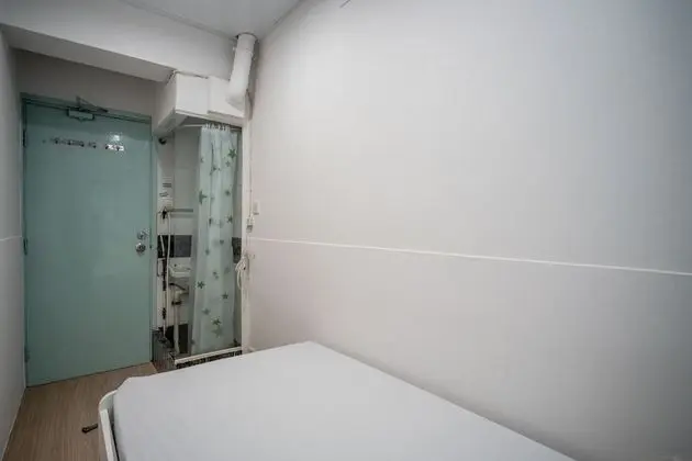 Single bed with shared bathroom