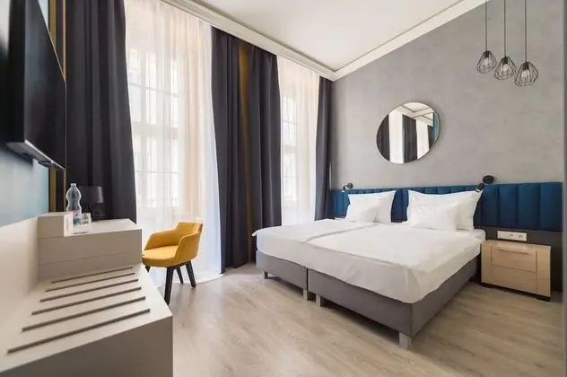 Deluxe Tek Büyük veya İki Ayrı Yataklı Oda