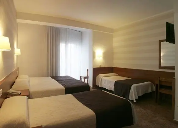 Habitación cuádruple con balcón