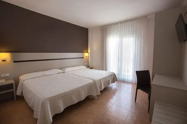 Habitación cuádruple con balcón