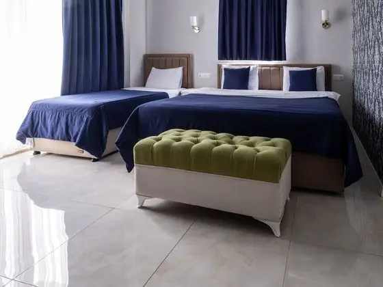 Deluxe Üç Kişilik Oda (3 People)