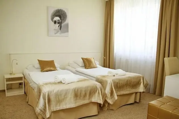 Deluxe Tek Büyük veya İki Ayrı Yataklı Oda