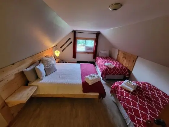 Deluxe Üç Kişilik Oda, Birden Çok Yatak, Sigara İçilmez, Bahçe Manzaralı