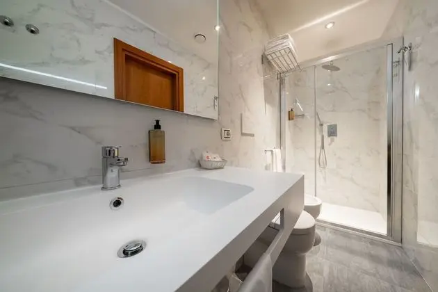 Tek Büyük veya İki Ayrı Yataklı Oda, Bahçe Manzaralı