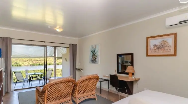 River Front Room With Patio