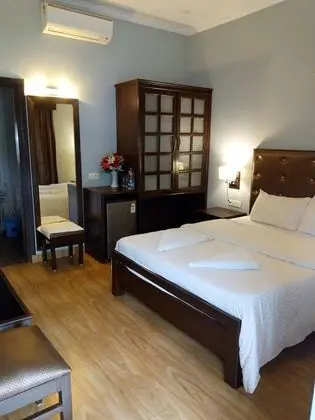 Deluxe Dört Kişilik Oda, 1 Yatak Odası, Balkon, Bahçe Manzaralı