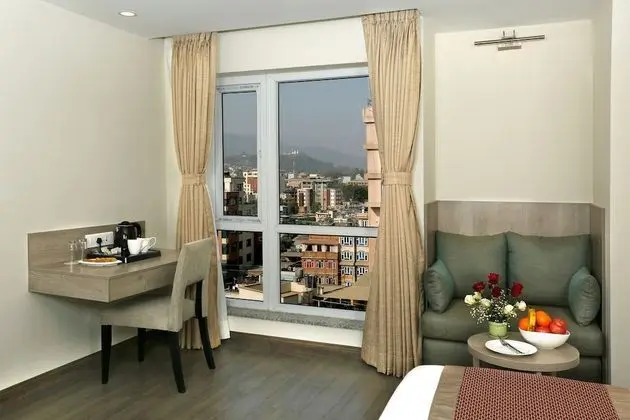 Deluxe Tek Büyük veya İki Ayrı Yataklı Oda