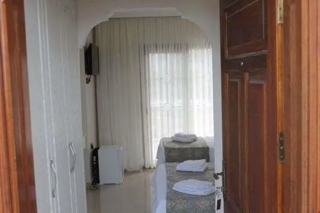 Üç Kişilik Oda