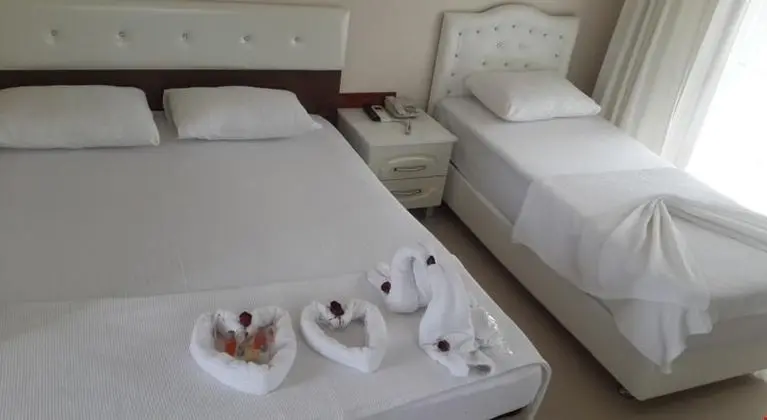 Üç Kişilik Oda