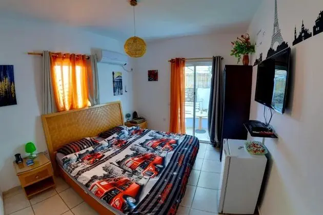 Comfort Tek Büyük veya İki Ayrı Yataklı Oda, Bahçe Manzaralı, Zemin Kat