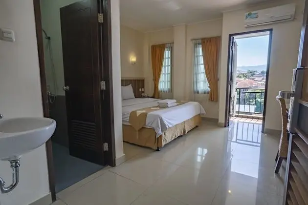 Deluxe Tek Büyük veya İki Ayrı Yataklı Oda