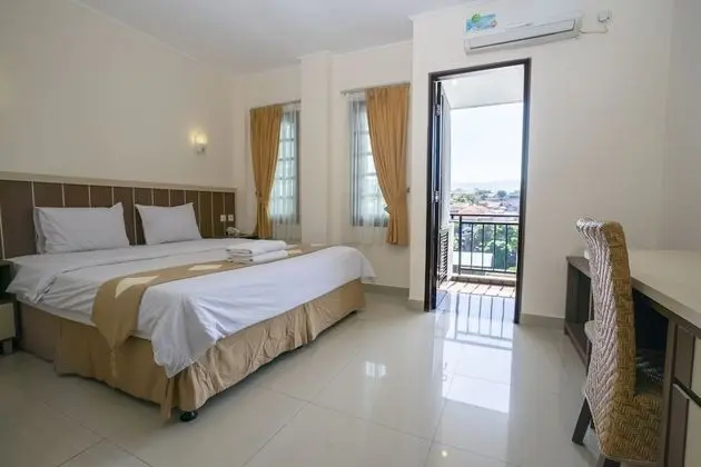 Deluxe Tek Büyük veya İki Ayrı Yataklı Oda