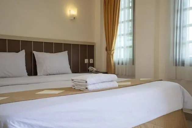 Deluxe Tek Büyük veya İki Ayrı Yataklı Oda