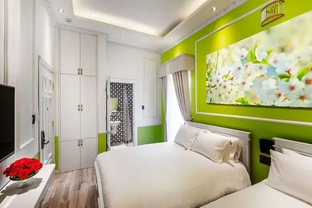 Deluxe Üç Kişilik Oda