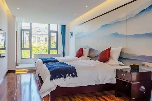 Deluxe Tek Büyük veya İki Ayrı Yataklı Oda, Küvet