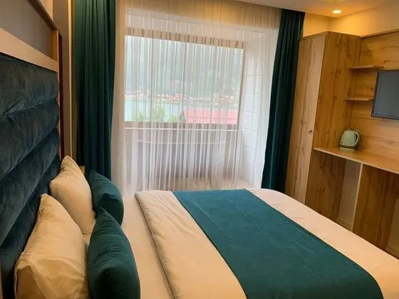DELUXE  GÖL MANZARALI ÇİFT KİŞİLİK ODA  - 203 303