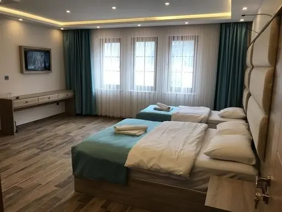 Üç Kişilik Oda