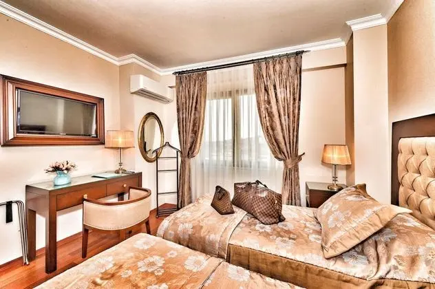 Deluxe Tek Büyük veya İki Ayrı Yataklı Oda, 1 Çift Kişilik veya 2 Tek Kişilik Yatak