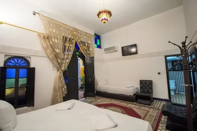 Üç Kişilik Oda