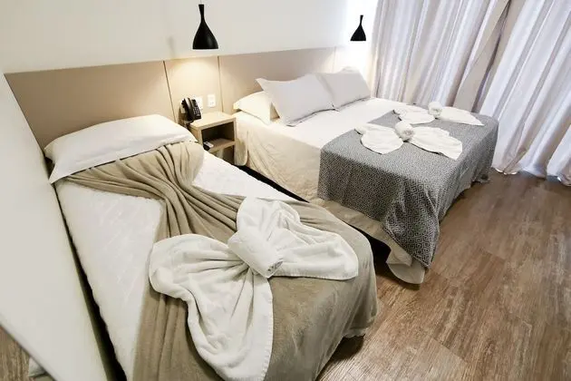 Suíte Triplo Luxo com sacada