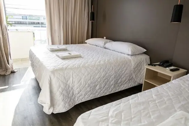 Suíte Triplo Luxo com sacada
