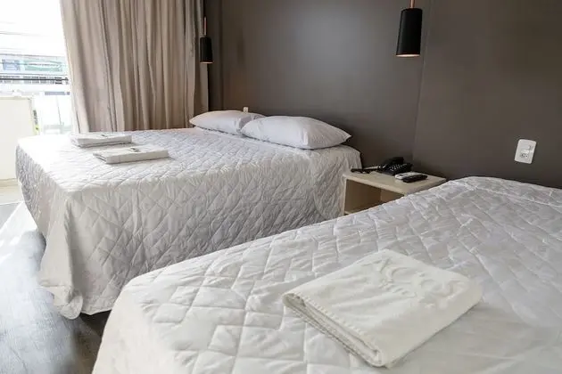 Suíte Triplo Luxo com sacada