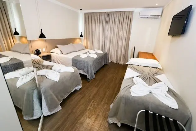 Suíte Triplo Luxo com sacada