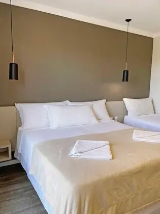 Suíte Triplo Luxo com sacada